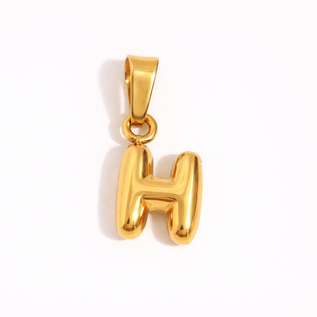 Gold letter H charm pendant with glossy sculptural finish
